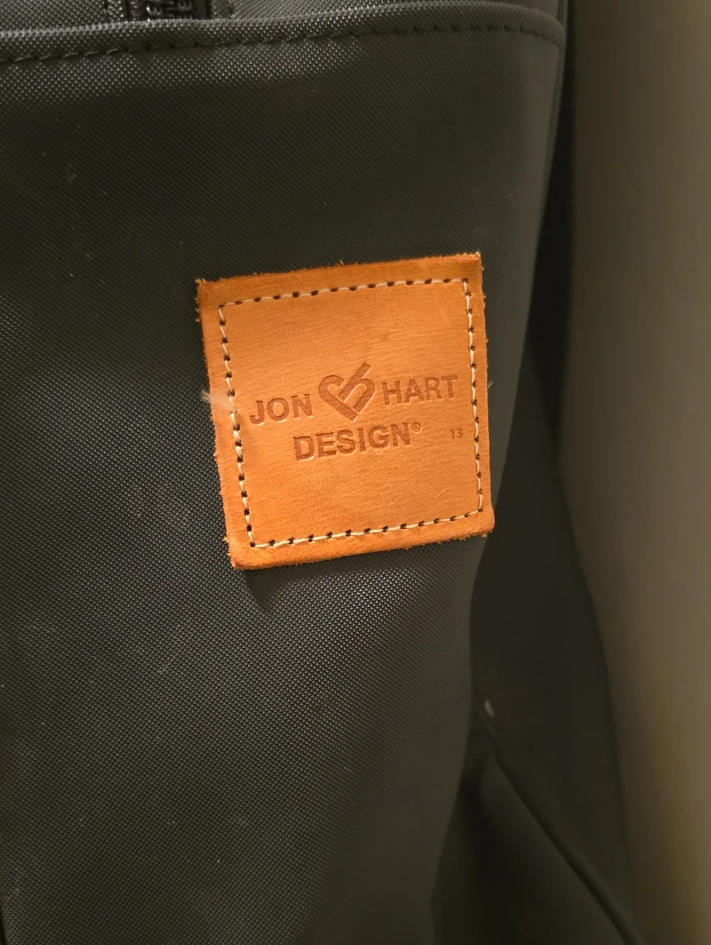 Black Jon Hart Backpack with Tan Accents